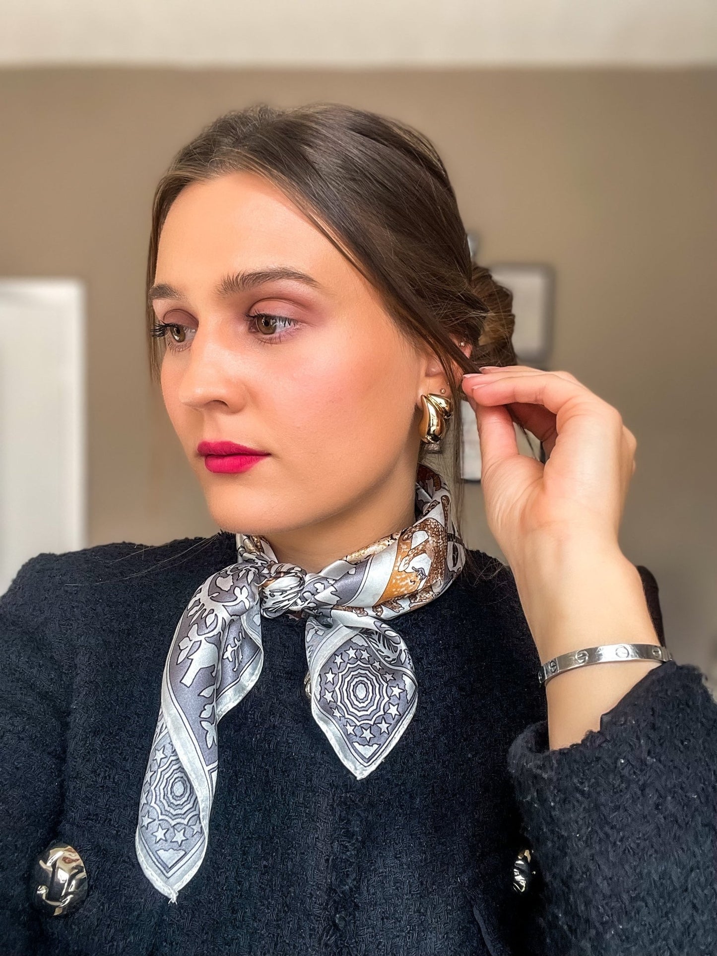 model wearing printed silk scarf around the neck by dimo silk
