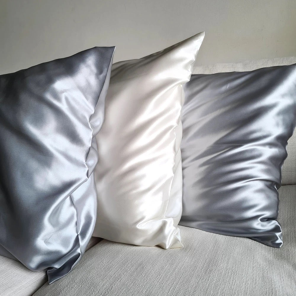 Silk pillowcases in white and grey by dimo designed to improve skin and hair condition