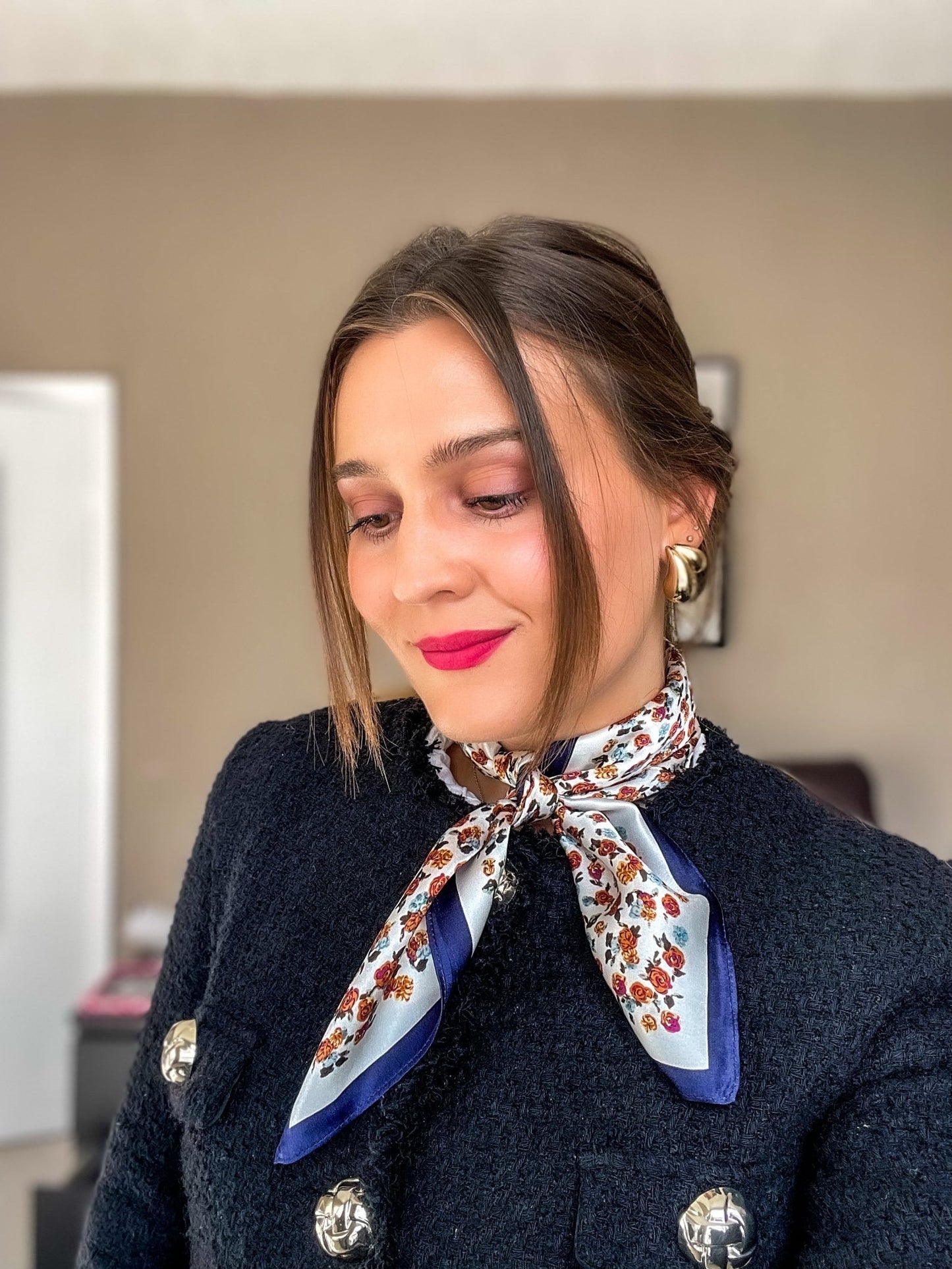 model wearing printed Silk scarf around neck in a bowtie, by dimo