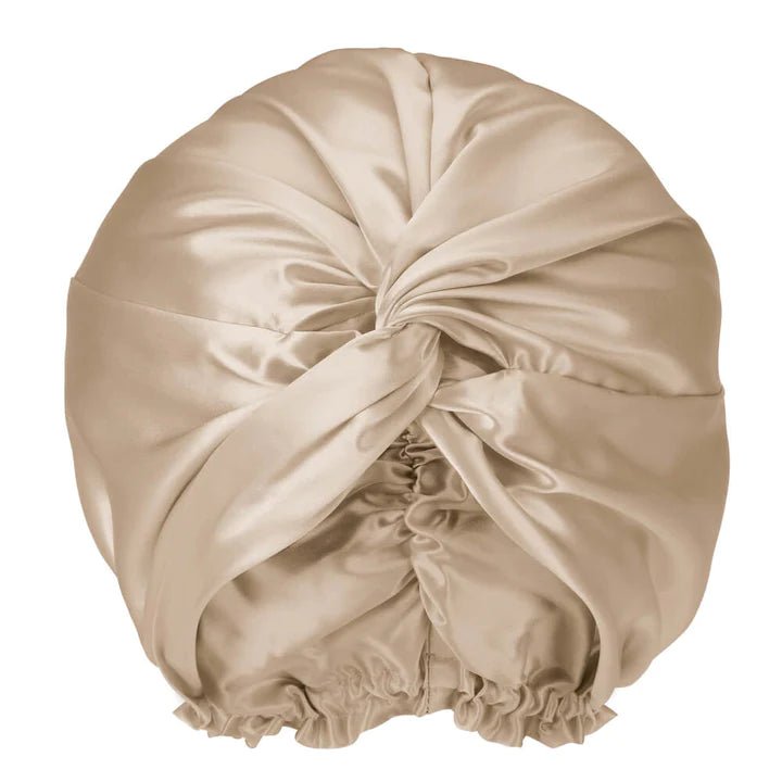 Premium silk hair bonnet made from 100% mulberry silk, ideal for preventing hair damage, frizz, and split ends while preserving hair moisture