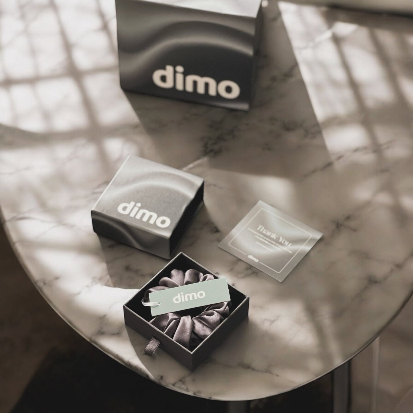 dimo silk gift box, grey silk scrunchie, holiday gift