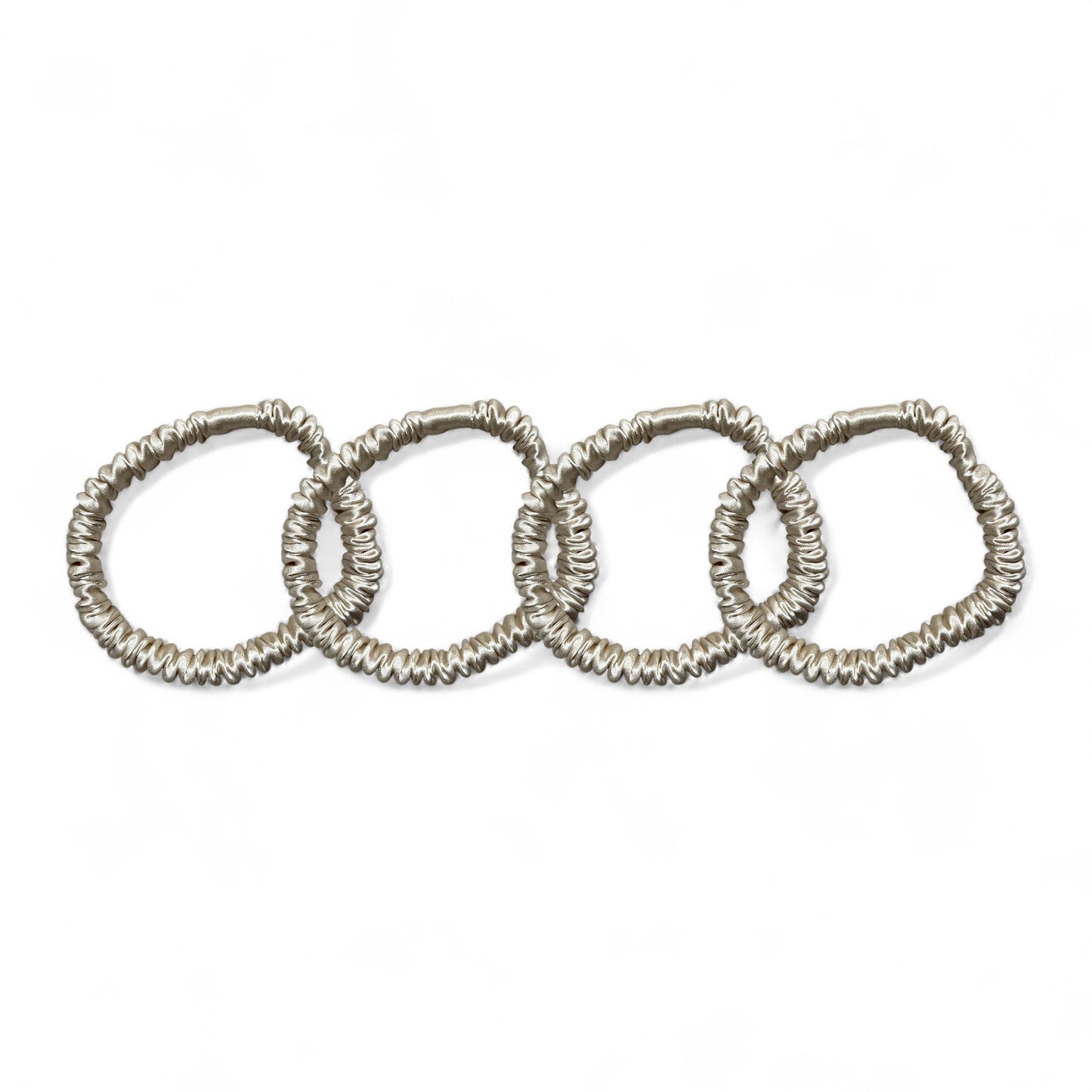 dimo silk scrunchies designed to protect your hair from tugging