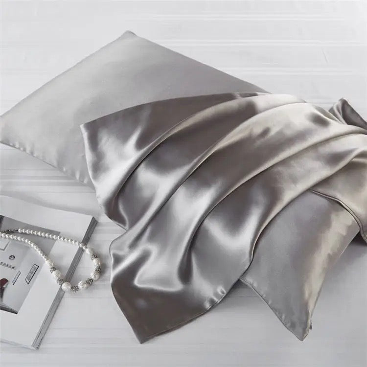 100% mulberry silk king size pillowcase in grey, perfect for reducing friction, preventing wrinkles, and ensuring healthier hair and skin overnight.